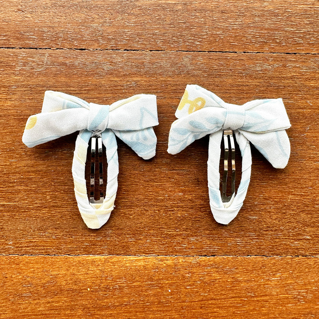 Tinsel Bow Click Clack