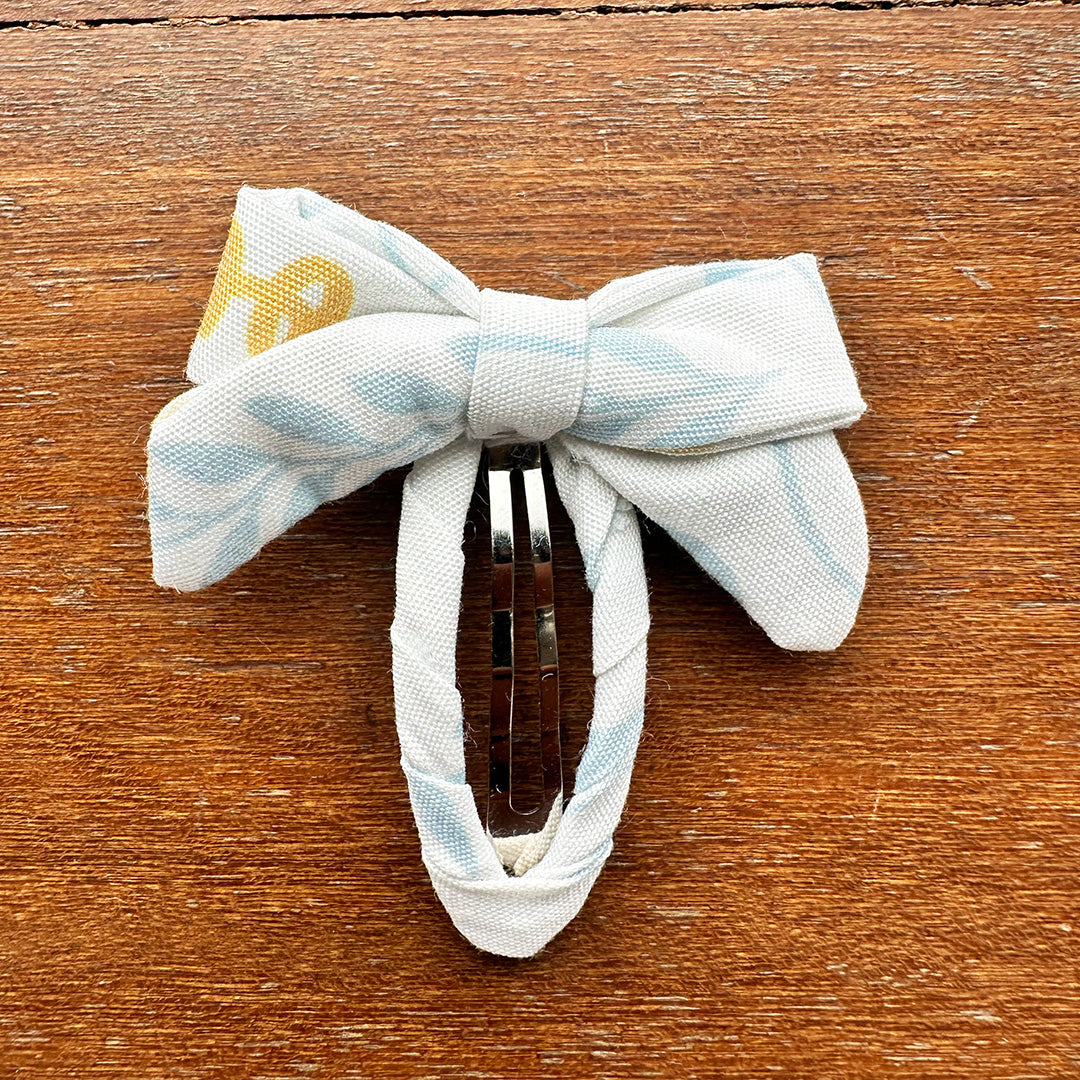 Tinsel Bow Click Clack